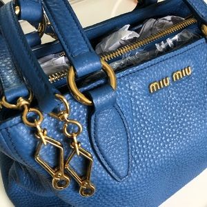 Miu Miu Pebbled Leather Handbag with strap